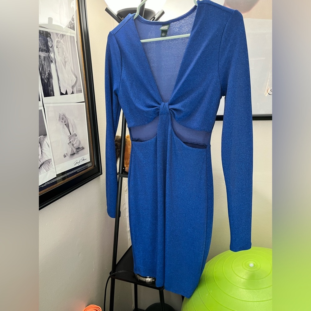 Super sexy, revealing blue glitter style dress